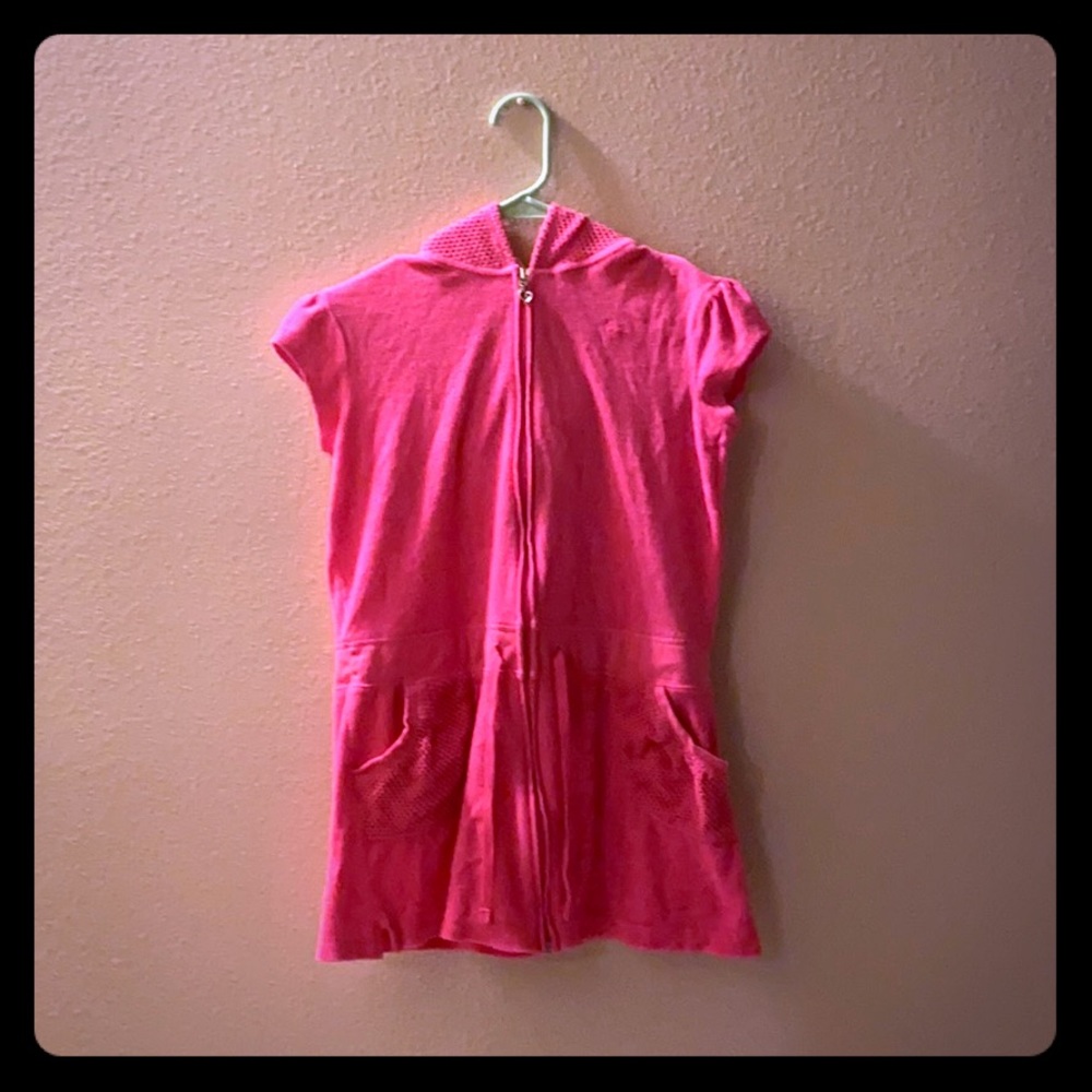 This is a pink bathing suit cover from Justice.
